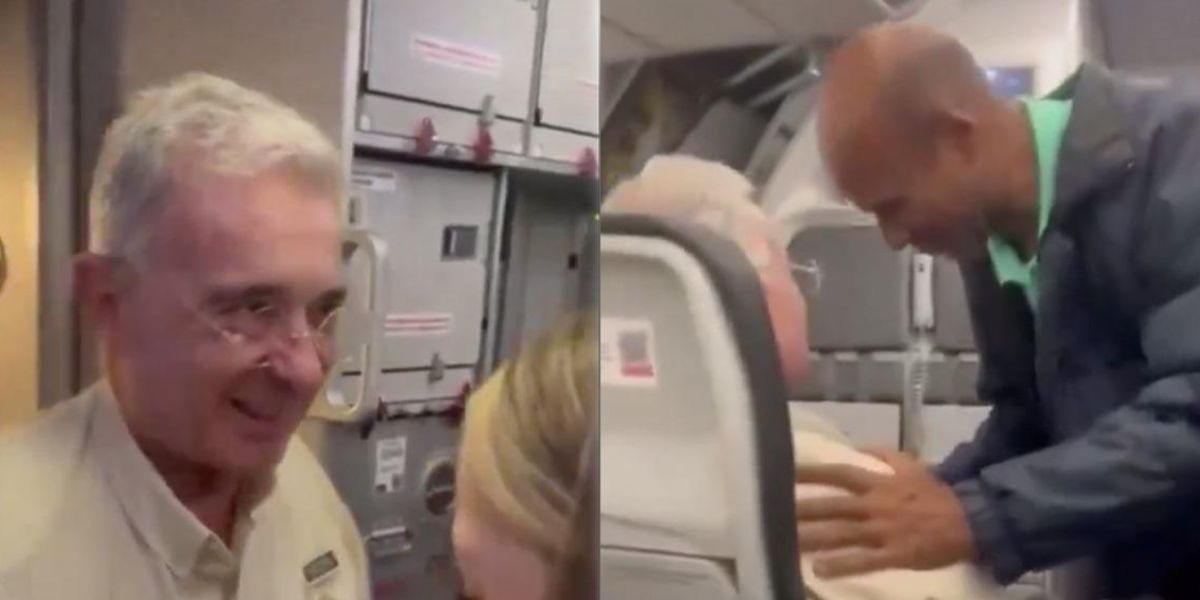 Zona Cero Álvaro Uribe recibiendo saludos en el avión.