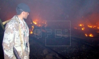 Seguridad de Pakistán en el sitio de la emergencia. 