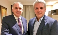 Iván Duque, el nuevo presidente electo de Colombia junto al efe de Misión de Verificación de ON, Jean Arnault.