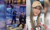n las imágenes se ve a la joven caleña inconsciente en el piso y un policía sobre ella