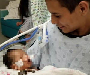  Bebé con su padre Yovany López.